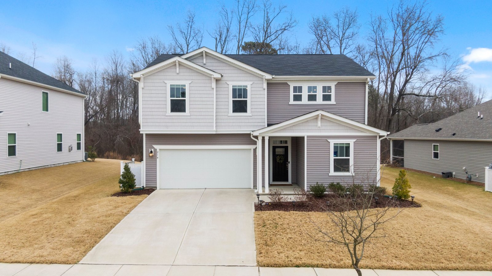 Charming two-story suburban home with garage in Fuquay-Varina, NC.